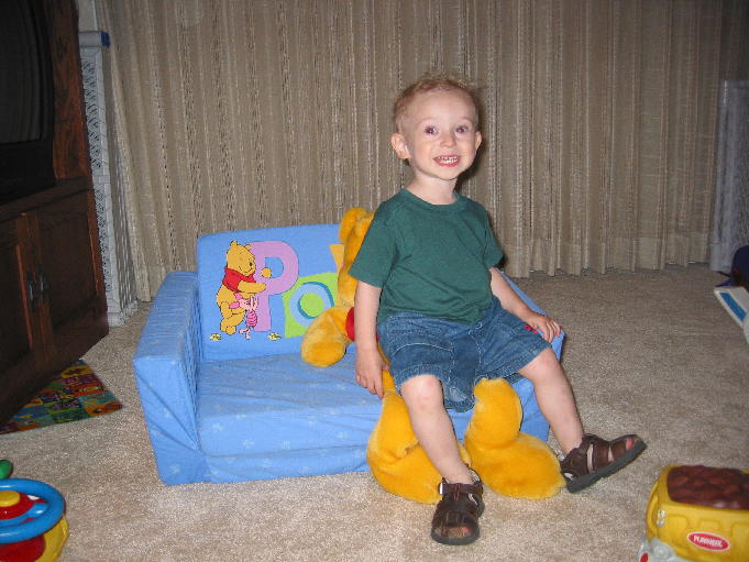Bradley uses Pooh Bear to practice for when Santa is at the mall